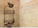 Shower featuring a rainfall shower head and black shelving at 16308 E Wyoming Dr, Aurora, CO 80017