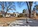 Spacious backyard with shed and mature trees at 5648 E Greenwood Pl, Denver, CO 80222