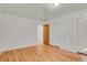 Bright bedroom with hardwood floors and ample closet space at 5648 E Greenwood Pl, Denver, CO 80222