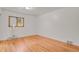 Bedroom with hardwood floors and built-in dresser at 5648 E Greenwood Pl, Denver, CO 80222