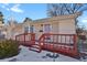 House exterior showcasing a red front porch and walkway at 5648 E Greenwood Pl, Denver, CO 80222