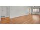 Spacious living room with hardwood floors and access to other rooms at 5648 E Greenwood Pl, Denver, CO 80222