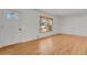 Living room featuring hardwood floors and ample natural light at 5648 E Greenwood Pl, Denver, CO 80222