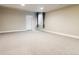View of this finished basement with new carpet, recessed lighting, and neutral paint at 1208 S Valentia Ct, Denver, CO 80247