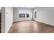 Bedroom featuring wood floors and large windows that offer a view of surrounding buildings at 14281 Currant, Broomfield, CO 80020