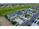 Aerial view of homes and a golf course at 16198 E 111Th Pl, Commerce City, CO 80022