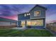 Two story home with backyard, patio, and landscaping at 16198 E 111Th Pl, Commerce City, CO 80022