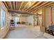 Unfinished basement with high ceilings and large windows at 16198 E 111Th Pl, Commerce City, CO 80022