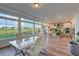 Bright dining area with large windows overlooking backyard at 16198 E 111Th Pl, Commerce City, CO 80022