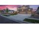 Two-story home with stone and siding exterior, and two-car garage at 16198 E 111Th Pl, Commerce City, CO 80022