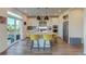 Modern kitchen with island, stainless steel appliances, and ample counter space at 16198 E 111Th Pl, Commerce City, CO 80022