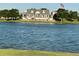Community clubhouse across the lake at 16198 E 111Th Pl, Commerce City, CO 80022