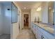 Main bathroom with double vanity and walk-in shower at 16198 E 111Th Pl, Commerce City, CO 80022