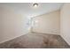 Spacious bedroom with neutral walls and carpet flooring at 11565 Decatur St # 7D, Denver, CO 80234