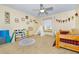 bedroom featuring themed decor, toys and carpeted floors at 1673 Woodmoor Dr, Monument, CO 80132