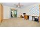Bedroom with neutral walls, carpet, and walkout to deck with exercise equipment at 1673 Woodmoor Dr, Monument, CO 80132