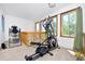 Bonus room showcasing exercise equipment and natural lighting at 1673 Woodmoor Dr, Monument, CO 80132