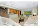 Inviting living room with comfortable sofas, mini bar, and large screen TV for entertainment at 1673 Woodmoor Dr, Monument, CO 80132