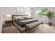 Stylish bedroom with a large window, modern furniture, and a neutral color palette at 3770 Osceola St, Denver, CO 80212