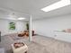 Finished basement with plush carpet and comfortable seating area at 11650 Baca Rd, Conifer, CO 80433