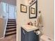 A stylish bathroom featuring a toilet, sink and decorations at 745 Stowe St, Highlands Ranch, CO 80126