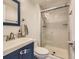Modern bathroom with stylish vanity and glass-enclosed shower at 745 Stowe St, Highlands Ranch, CO 80126