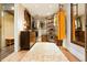 Spacious walk-in closet with custom shelving and drawers, offering ample storage at 24798 Foothills N Dr, Golden, CO 80401