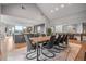 Open concept dining room featuring a large dining table and views into the kitchen at 24798 Foothills N Dr, Golden, CO 80401