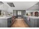 Spacious kitchen with modern appliances, custom cabinetry, and a large center island at 24798 Foothills N Dr, Golden, CO 80401