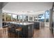 Open kitchen featuring stainless steel appliances, large center island, and scenic views at 24798 Foothills N Dr, Golden, CO 80401