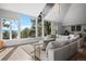 Bright living room with large windows offering great mountain views and modern decor at 24798 Foothills N Dr, Golden, CO 80401