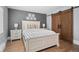 A beautifully decorated main bedroom featuring stylish furniture and natural light at 24798 Foothills N Dr, Golden, CO 80401