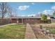 Brick home with well manicured lawn and ample space for outdoor enjoyment at 10 Merideth Ln, Longmont, CO 80501