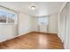 Hardwood floors, neutral colors and two windows make this bedroom bright and open at 10 Merideth Ln, Longmont, CO 80501