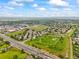 Aerial view of the neighborhood featuring green spaces, a park, and a playground at 5370 S Union Way, Littleton, CO 80127
