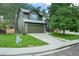 Charming two-story home with a well-manicured front lawn and mature trees at 5370 S Union Way, Littleton, CO 80127