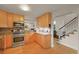 Modern kitchen with stainless steel appliances and plenty of cabinet space at 5370 S Union Way, Littleton, CO 80127