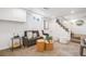 Finished basement with carpeted floors, a comfortable sofa, and stylish decor at 3015 Pierce St, Wheat Ridge, CO 80214