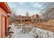 Home has a large backyard with other apartments nearby at 950 Jasmine St, Denver, CO 80220