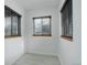 Bright sunroom features neutral paint, modern floors and three large windows that let in plenty of natural light at 950 Jasmine St, Denver, CO 80220