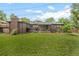 Expansive backyard with plenty of space for recreation, featuring a patio and well-kept lawn at 5455 E Iowa Ave, Denver, CO 80222
