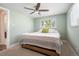 Bedroom featuring a ceiling fan, and a window offering natural light at 5455 E Iowa Ave, Denver, CO 80222