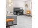 Inviting living room with piano, hardwood floors, and stylish decor at 5455 E Iowa Ave, Denver, CO 80222