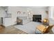 Bright living area featuring a piano, modern furniture, and stylish decor at 5455 E Iowa Ave, Denver, CO 80222