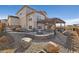 Beautiful backyard with patio, fire pit, and pergola for relaxing and entertaining at 806 Flora View Dr, Erie, CO 80516