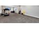Finished basement with carpet and space for a home gym at 806 Flora View Dr, Erie, CO 80516
