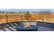 Outdoor backyard firepit with views at 806 Flora View Dr, Erie, CO 80516