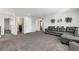 Spacious living room with a comfortable sectional sofa at 806 Flora View Dr, Erie, CO 80516