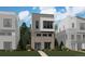 Beautiful three-story home with modern architectural design and a well-manicured front lawn at 11493 E Briarwood Cir, Centennial, CO 80112