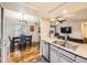 Open kitchen layout overlooking the dining and living areas, creating a cohesive and inviting space at 2104 Vineyard Dr, Castle Rock, CO 80104